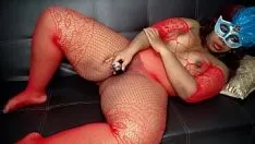 Masked ebony stimulates her clitoris with her clit massager